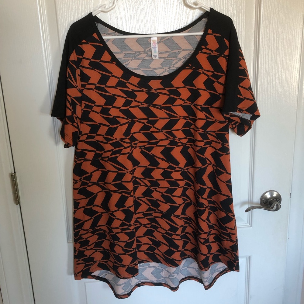 New Lula Roe orange and black shirt